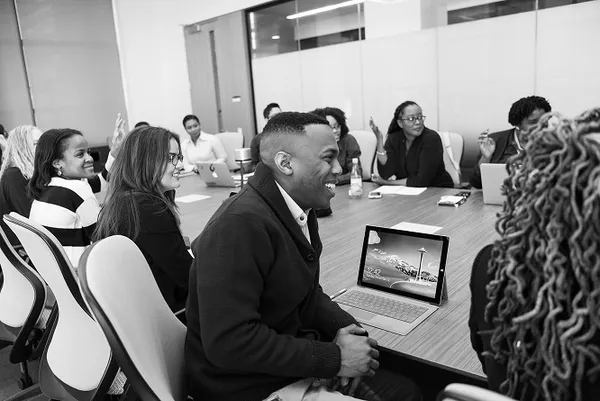 An image of people in an office